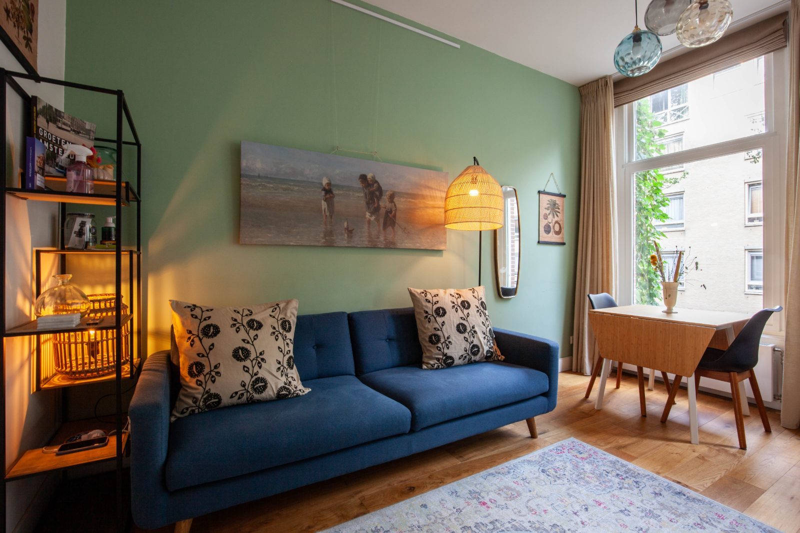 Blue sofa and green wall