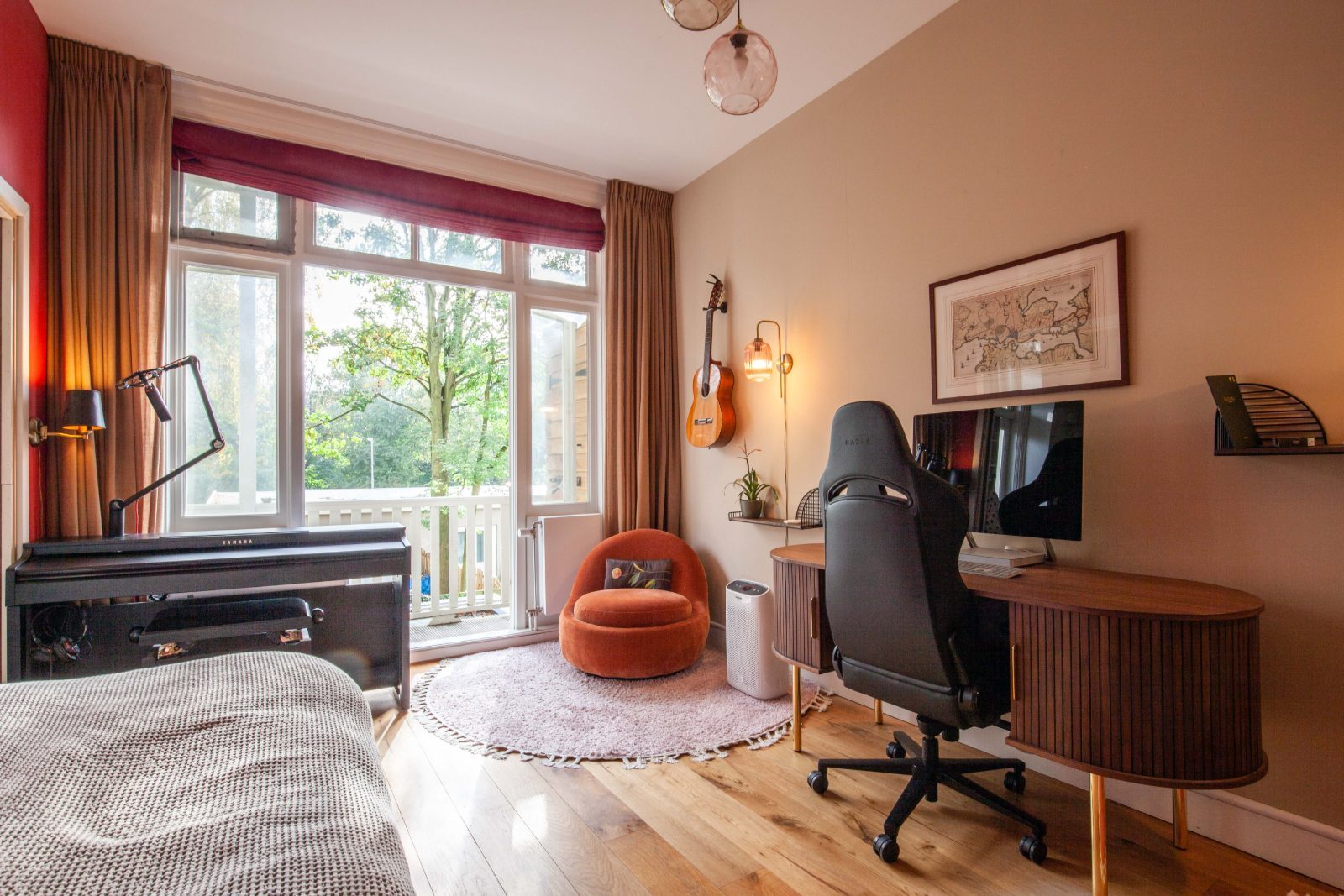 Digital piano and desk by the balcony